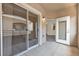 Outdoor patio featuring view of the building's interior through sliding glass door at 9330 W Maule Ave # 212, Las Vegas, NV 89148