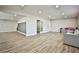 Expansive bonus room offers flexible space for various activities, including a sitting area at 9340 W Washburn Rd, Las Vegas, NV 89149