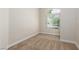 Bedroom with carpet floor, baseboards and a big window at 9404 Calico Garden Ave, Las Vegas, NV 89134