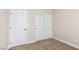 A well-lit bedroom featuring a view to closet doors at 9404 Calico Garden Ave, Las Vegas, NV 89134