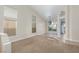 Spacious living room with high ceilings, neutral paint, and large windows for ample light at 9404 Calico Garden Ave, Las Vegas, NV 89134