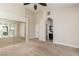 Large main bedroom with mirrored closet doors and an ensuite bathroom at 9404 Calico Garden Ave, Las Vegas, NV 89134