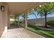 Relaxing covered patio area, perfect for outdoor seating and enjoying the garden view at 9404 Calico Garden Ave, Las Vegas, NV 89134