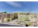 Fenced backyard featuring a covered patio area with lattice and hardscape at 952 Crescent Falls St, Henderson, NV 89011