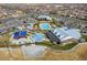 Community aerial view showcasing the pool, splash pad, playground and recreation buildings at 9654 Ponderosa Skye Ct, Las Vegas, NV 89166