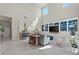 Bright living room features high ceilings, large windows, custom built-ins at 9654 Ponderosa Skye Ct, Las Vegas, NV 89166