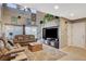Spacious living room featuring high ceilings, large windows, and a sliding door at 9931 Cherry Melee Ave, Las Vegas, NV 89148