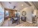 This dining room features hardwood floors and a unique wood accent wall at 10149 Terrastone Dr, Las Vegas, NV 89148