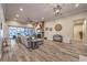 Spacious living room with tile floors, fireplace, and access to the backyard at 10149 Terrastone Dr, Las Vegas, NV 89148