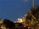 Distant buildings can be seen in the valley in this evening shot at 10149 Terrastone Dr, Las Vegas, NV 89148