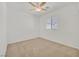 Neutral bedroom with carpet, a ceiling fan, and natural light from the window at 10162 Sunshine Village Pl, Las Vegas, NV 89183