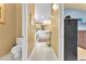 Hallway view to bathroom with dual sinks and vanity space at 1035 Tabor Hill Ave, Henderson, NV 89074