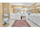 Bright bathroom with dual sinks, vanity, and many mirrors at 1035 Tabor Hill Ave, Henderson, NV 89074