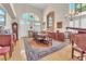 Spacious dining room featuring high ceilings, stained glass windows, and hardwood floors at 1035 Tabor Hill Ave, Henderson, NV 89074