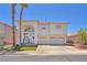 Charming two-story home boasting well-kept landscaping, a three-car garage, and beautiful architectural details at 1035 Tabor Hill Ave, Henderson, NV 89074