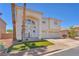 Inviting home featuring a well-manicured lawn and a welcoming front entrance with decorative wreath at 1035 Tabor Hill Ave, Henderson, NV 89074