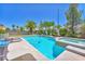 Inviting backyard with a sparkling pool, spa, and plenty of space for lounging at 1035 Tabor Hill Ave, Henderson, NV 89074