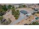 Aerial view of property with a big space to park many vehicles and recreational vehicles at 1050 Bruce St, Pahrump, NV 89048