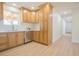 Bright kitchen features white countertops, stainless steel appliances, and wood cabinets at 1050 Bruce St, Pahrump, NV 89048