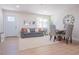 Comfortable living room with a neutral color palette and view of an exterior window at 1050 Bruce St, Pahrump, NV 89048