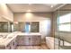 Elegant bathroom showcasing a double vanity, soaking tub, and a separate glass shower at 11280 Granite Ridge Dr # 1035, Las Vegas, NV 89135