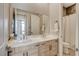 Bright bathroom featuring a double vanity, modern fixtures, and a separate toilet room at 11280 Granite Ridge Dr # 1035, Las Vegas, NV 89135