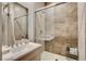 Updated bathroom with a vanity, mirror and a glass enclosed shower at 11280 Granite Ridge Dr # 1035, Las Vegas, NV 89135
