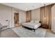 Well-lit bedroom with a comfortable bed, elegant curtains, and a modern nightstand at 11280 Granite Ridge Dr # 1035, Las Vegas, NV 89135