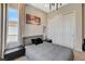 Cozy bedroom with a comfortable bed, modern decor, and a large closet for ample storage space at 11280 Granite Ridge Dr # 1035, Las Vegas, NV 89135
