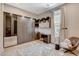 Comfortable room with large closet, built-in desk, and chair with table at 11280 Granite Ridge Dr # 1035, Las Vegas, NV 89135