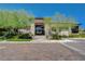 Front of the community clubhouse featuring decorative landscaping at 11280 Granite Ridge Dr # 1035, Las Vegas, NV 89135