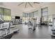 Community fitness center with abundant natural light and exercise equipment at 11280 Granite Ridge Dr # 1035, Las Vegas, NV 89135