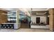 Well-equipped fitness center featuring stone accents and a reception desk for resident convenience at 11280 Granite Ridge Dr # 1035, Las Vegas, NV 89135