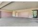 Spacious garage featuring multiple garage doors and a pedestrian entrance at 11280 Granite Ridge Dr # 1035, Las Vegas, NV 89135