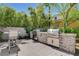 Outdoor kitchen and grilling area perfect for entertaining at 11280 Granite Ridge Dr # 1035, Las Vegas, NV 89135