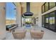 Outdoor patio with fire pit and comfortable seating at 11280 Granite Ridge Dr # 1035, Las Vegas, NV 89135