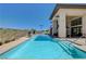 Community pool with lounge chairs and scenic views at 11280 Granite Ridge Dr # 1035, Las Vegas, NV 89135
