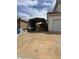 Adjacent to the home is a spacious car port on a concrete drive at 128 Appian Way, Henderson, NV 89002