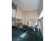 Open living room with high ceilings and plenty of natural light at 128 Appian Way, Henderson, NV 89002