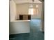 Living room with cabinet, window and view to another area at 128 Appian Way, Henderson, NV 89002