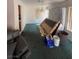 The living room features a green carpet at 128 Appian Way, Henderson, NV 89002