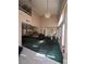 Spacious living room with high ceilings and large windows at 128 Appian Way, Henderson, NV 89002