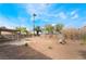 Spacious backyard featuring trees and an extended patio area at 1356 Spague St, Henderson, NV 89011