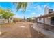Spacious backyard featuring a patio, landscaping, and privacy fencing at 1356 Spague St, Henderson, NV 89011