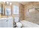 Beautiful bathroom featuring custom tile work, a vanity, and a bathtub with shower at 1356 Spague St, Henderson, NV 89011