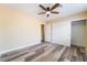 Spacious bedroom with ceiling fan and closet, providing ample space and comfort at 1356 Spague St, Henderson, NV 89011