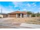 Inviting single-story home with a low maintenance desert landscape and attached garage at 1356 Spague St, Henderson, NV 89011