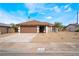 Inviting single-story house boasts a manicured front yard and attached two-car garage at 1356 Spague St, Henderson, NV 89011
