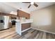 Modern kitchen featuring stainless steel appliances and a breakfast bar with seating at 1356 Spague St, Henderson, NV 89011