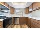Modern kitchen with stainless steel appliances and ample counter space at 1356 Spague St, Henderson, NV 89011